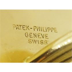 Pair of Patek Philippe Nautilus 18ct yellow gold and diamond cufflinks, with sapphire crystal, black-grey centre and diamond-set front, hallmarked, in original box