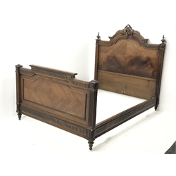  French Louis XVI style walnut double 4' 6'' bedstead, ornate carved shell pediment to headboard, turned finials, W146cm, H155cm, L205cm  