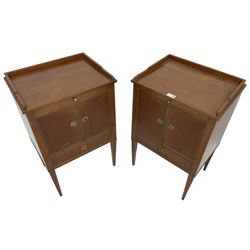 Pair of early 20th century bedside cabinets, fitted with brushing slide over cupboard and single drawer, each with gilt metal cock-beading, raised on square tapering supports