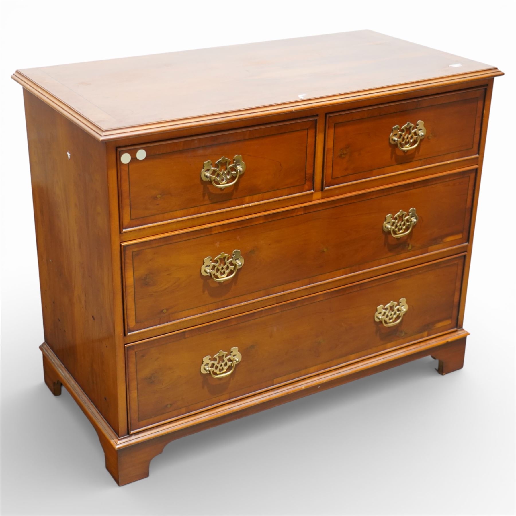 Late 20th century pair of yew wood chests of drawers, each with rectangular tops above two short over two long drawers, cockbeaded drawer fronts fitted with brass swan neck handles, raised on bracket feet