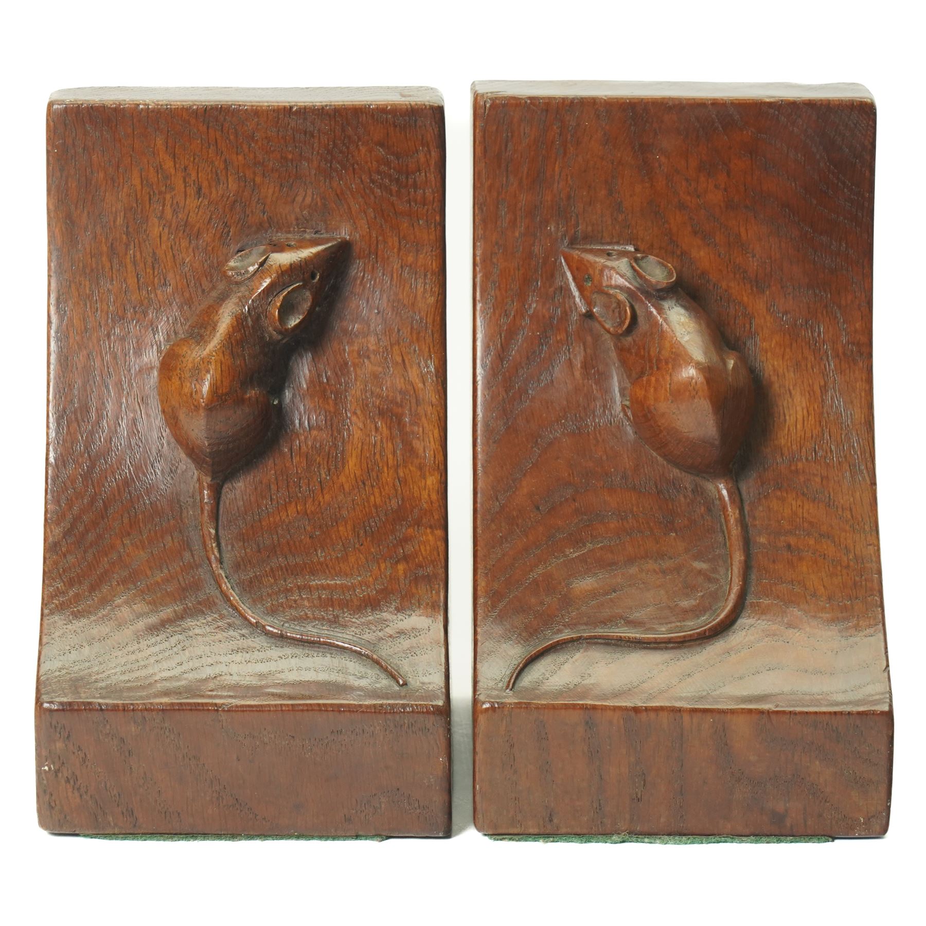 Mouseman - pair of circa 1940s/50s oak bookends, good colour, with carved mouse signatures forming a heart shape when side by side, by Robert Thompson of Kilburn