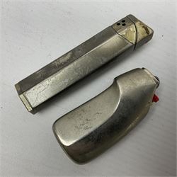 Collection of lighters, including Ronson Varaflame, Zorr Classic, Dunhill bark effect roller gas lighter, and faceted blue glass table lighter, etc