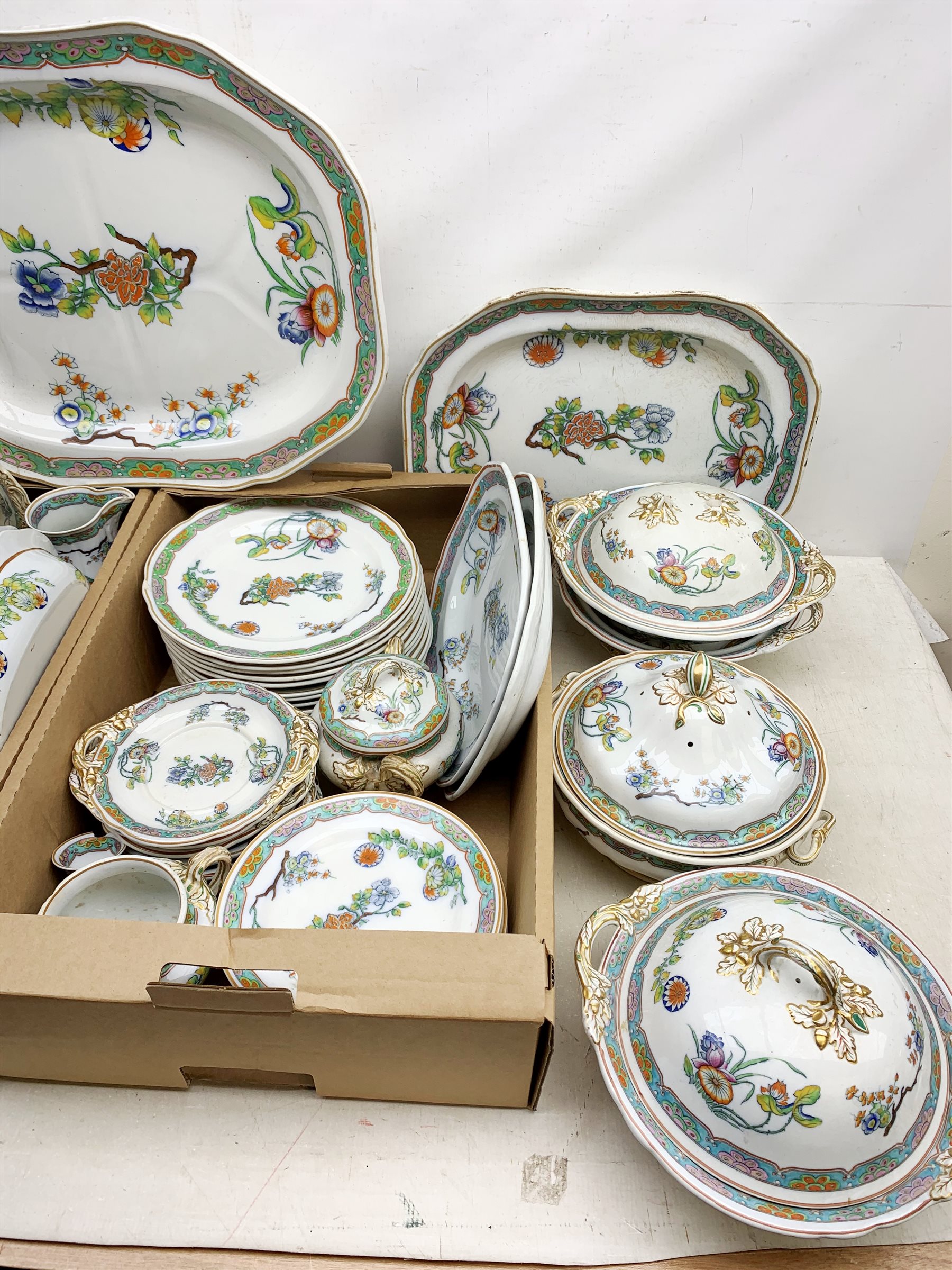 A matched Copeland Spode dinner service, decorated in a chinoiserie
