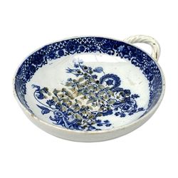 Late 18th/early 19th century Leeds Pottery egg drainer, the pierced bowl of circular form decorated with blue transfer printed floral spray and floral border, the twisted handle with foliate mounts, bowl D9cm