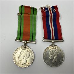 WW1 pair of medals awarded to 151761 Gnr. S. Loten R.A. with ribbons; four WW2 medals with ribbons; and small quantity of cap badges, medallions etc
