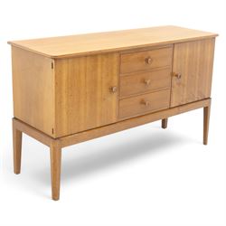 Gordon Russell - mid century modern teak sideboard, the rectangular top with rounded edges...