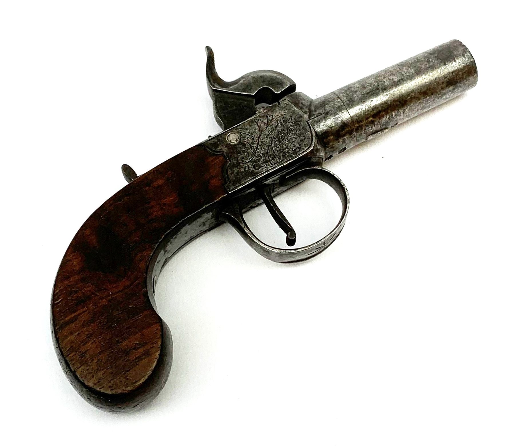 19th century English percussion box lock pocket pistol by Booth Huddersfield with (seized) turn-off barrel, engraved lock, walnut stock and thumb safety L16cm overall