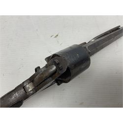 Mid-19th century Smith London .36 cal. transitional five-shot percussion revolver, the 12cm rifled octagonal barrel with side loading lever, side safety, some engraved decoration and chequered two-piece grip L28cm overall