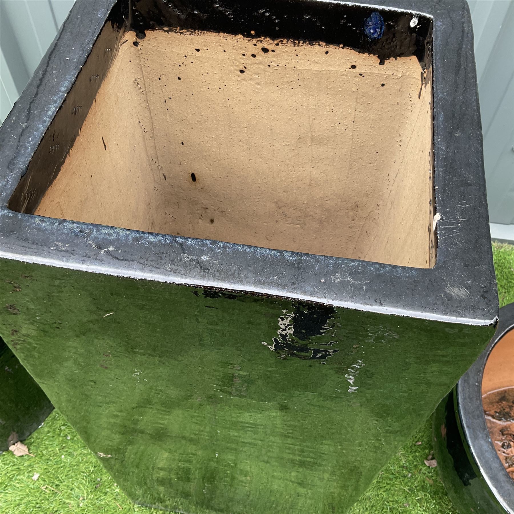 Large rectangular and circular terracotta glazed in black planters - THIS LOT IS TO BE COLLECTED BY APPOINTMENT FROM DUGGLEBY STORAGE, GREAT HILL, EASTFIELD, SCARBOROUGH, YO11 3TX