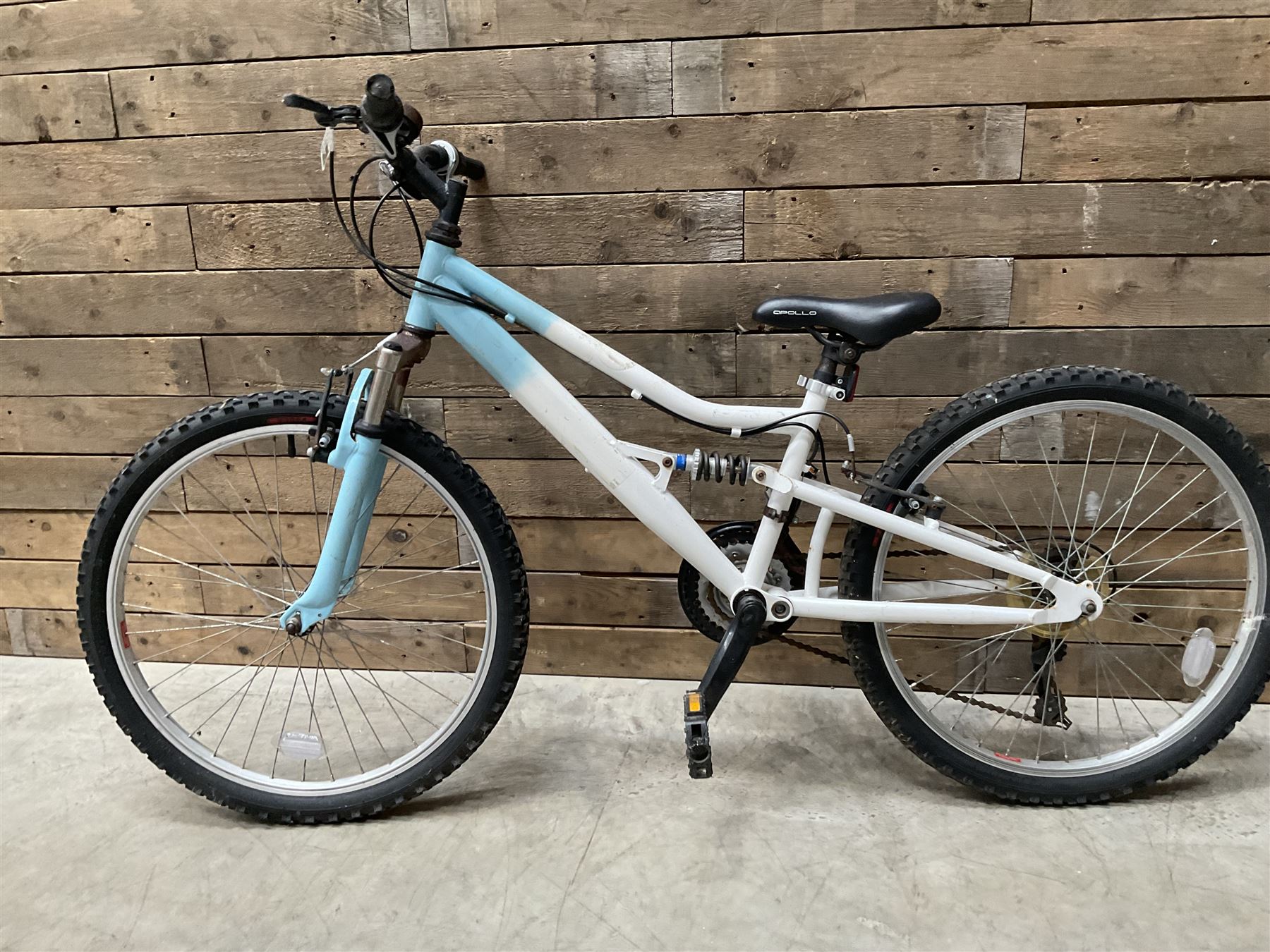 Three bicycles- man’s Falcon Storm 18 speed mountain bike; lady’s Dawes Sonoran 24 speed road bike; child’s Apollo 18 speed bike (3)