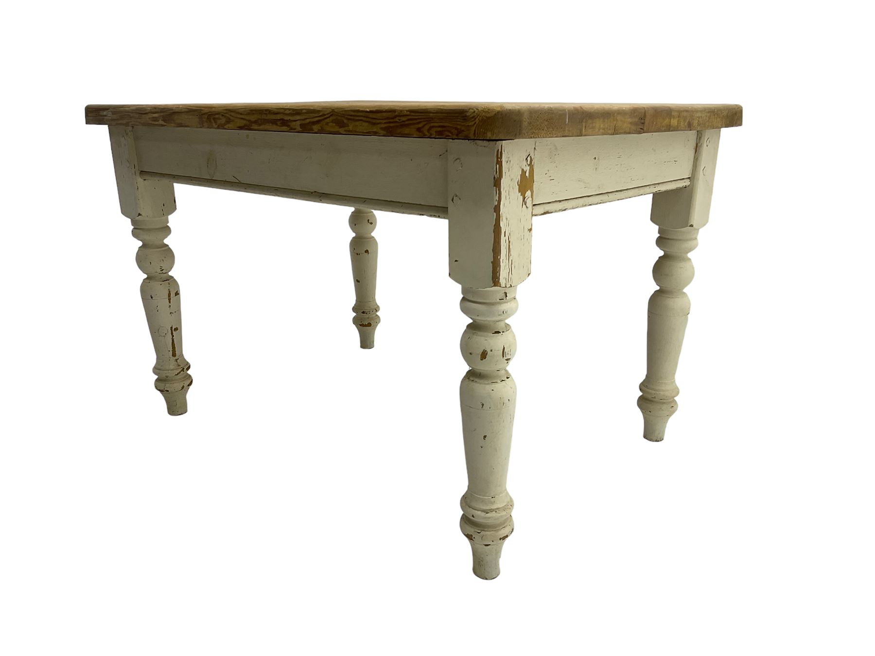 Traditional pine kitchen table with white painted base, rectangular top over single drawer, raised on turned supports