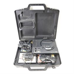 16-Bit Sega Mega Drive console with two controllers and four games, comprising Fifa 96, Sonic The Hedgehog 2, Sonic The Hedgehog Pinball and World Cup USA 94, contained within fitted plastic carrycase with instruction manual and cheats book