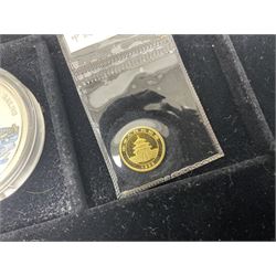 Single owner lifetime collection of mostly commemorative modern World coins with gold, silver and base metal examples, including two Queen Elizabeth II Bailiwick of Guernsey twenty-five pound gold coins 'The 1999 Royal Wedding' and '100th Anniversary of the End of the Victorian Era' 2001 each in 24 carat gold weighing 7.81 grams with certificates, silver coins commemorating the Millennium 2000 including Guyana sterling silver proof two-thousand dollars, Fiji sterling silver proof five dollars etc, silver coins from the Queen Elizabeth II Golden Jubilee Collection dated either 2002 or 2003 from Great Britain and the Commonwealth countries, United Kingdom commemorative crowns in card folders, The Royal Mint United Kingdom 1997 proof coin set in red folder without certificate etc