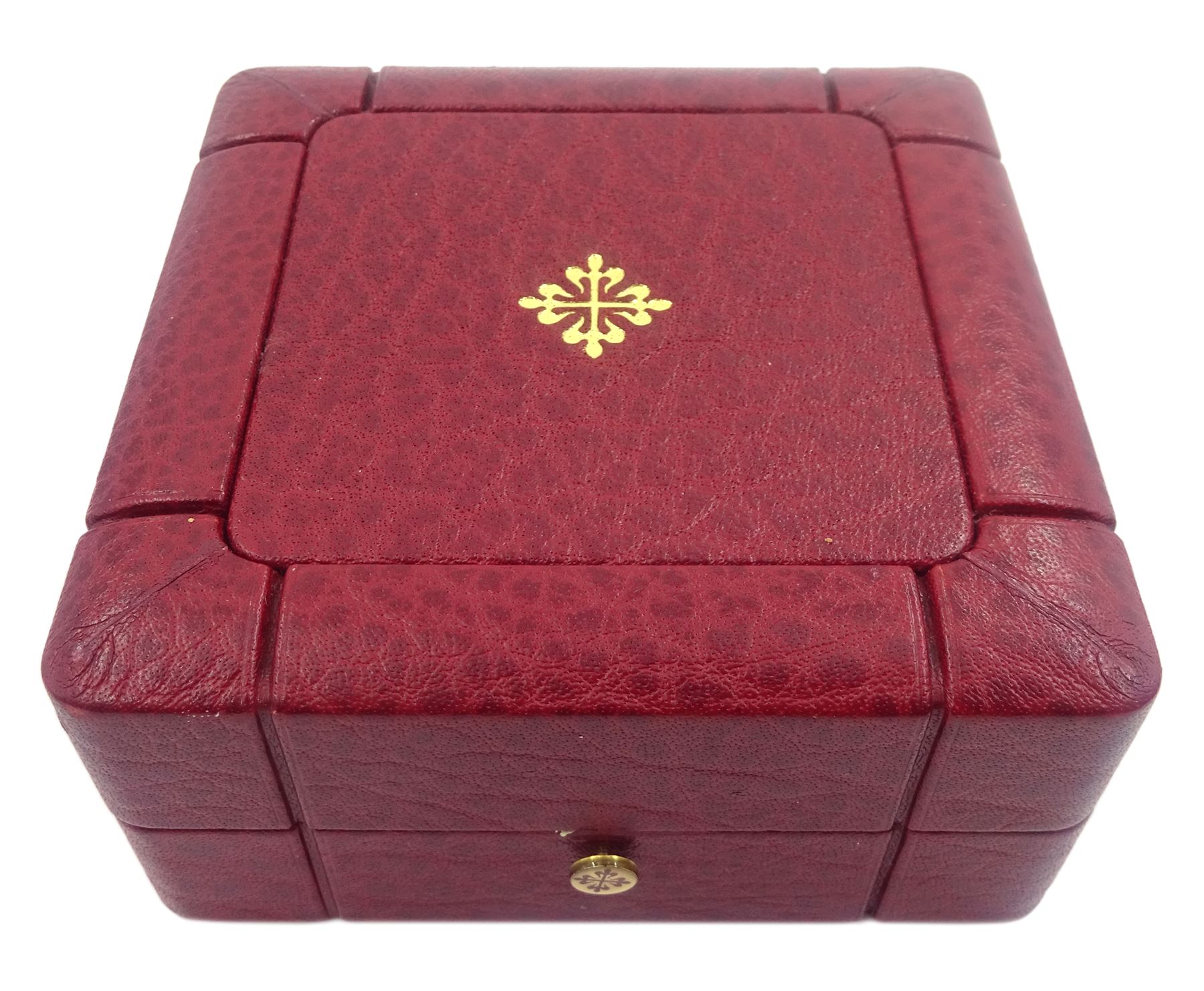 Pair of Patek Philippe Nautilus 18ct yellow gold and diamond cufflinks, with sapphire crystal, black-grey centre and diamond-set front, hallmarked, in original box