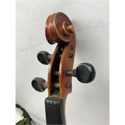 Czechoslovakian violin c1920 with 36cm two-piece maple back and ribs and spruce top, bears label 'Copy of Antonius Stradivarius Made in Czechoslovakia' L59cm; in carrying case; 1950s Czechoslovakian violin; and 195os Czechoslovakian three-quarter size violin; both cased (3)