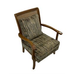 Mid-20th century beech armchair with cane back, upholstered seat with two cushions in striped fabric