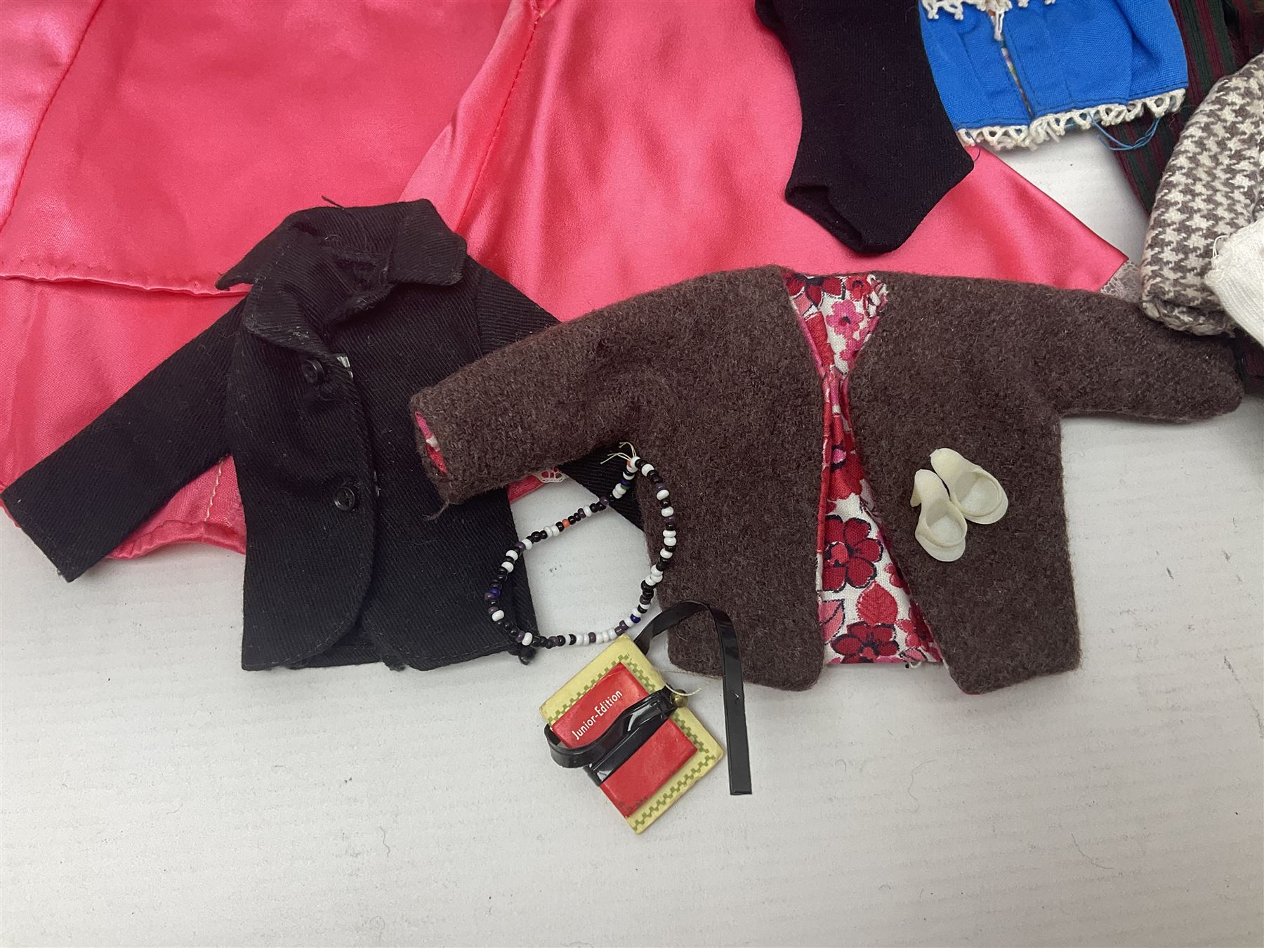 Two 1960s Mattel Barbie fashion dolls - 'Ski Queen' and 'Career Girl'; each in original decorative box with paperwork; and a quantity of Mattel and other fashion doll clothing