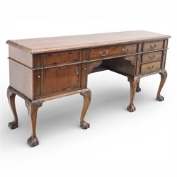 Georgian design mahogany sideboard, the rectangular top with moulded gadrooned edge, fitte...