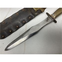 Scratch-built fighting/throwing knife, probably trench art, with 18cm steel spear type blade, plain cross-piece and French Lebel Rifle bayonet grip; in bras mounted studded leather sheath with belt hanger L29.5cm overall