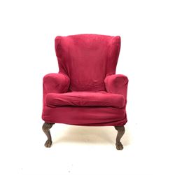 Georgian style wing back upholstered armchair, acanthus carved cabriole hairy paw feet
