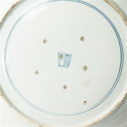 Japanese 19th century Arita style dish, painted centrally in blue and white with a lady carrying peaches, marked in blue to base, W28.5cm 