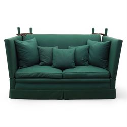 Late 20th century two-seat Knole sofa, covered in green woven fabric with lattice pattern, high panelled back and hinged drop arms secured by braided cords, loose cushioned seat and back with additional scatter cushions, on plinth base