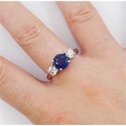 Platinum three stone sapphire and round brilliant cut diamond ring, sapphire approx 1.40 carat, total diamond weight approx 0.65 carat