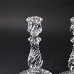 Pair of Baccarat Bambous glass candlesticks, with wrythen moulding, marked beneath, H19cm