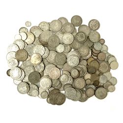 Approximately 1750 grams of Great British pre 1947 silver coins including half crowns, florins/two shillings, shillings, sixpence and threepence pieces