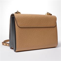 Louis Vuitton - ‘Twist’ MM Bag, the model introduced for the Cruise 2015 collection under Nicolas Ghesquière, in structured beige Epi cow hide leather with black sides, with gold-tone signature LV monogram twist-lock fastening and chain carrying handle, with detachable flat leather shoulder or crossbody strap, unused with original box and dust bag
