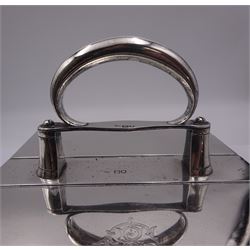 Edwardian silver mounted table cigar box, of rectangular form with central handle, lifting to open twin hinged covers to reveal two soft wood lined compartments, hallmarked Joseph Braham, London 1907, including handle H14.5cm not including handle H6.5cm L21cm D17cm 