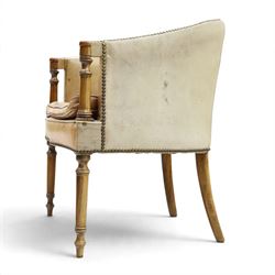 Early 20th century Georgian design mahogany framed desk or club armchair of tub form, with turned pilaster arm supports and legs with rear splayed supports, upholstered in faded tanned leather with loose seat cushion