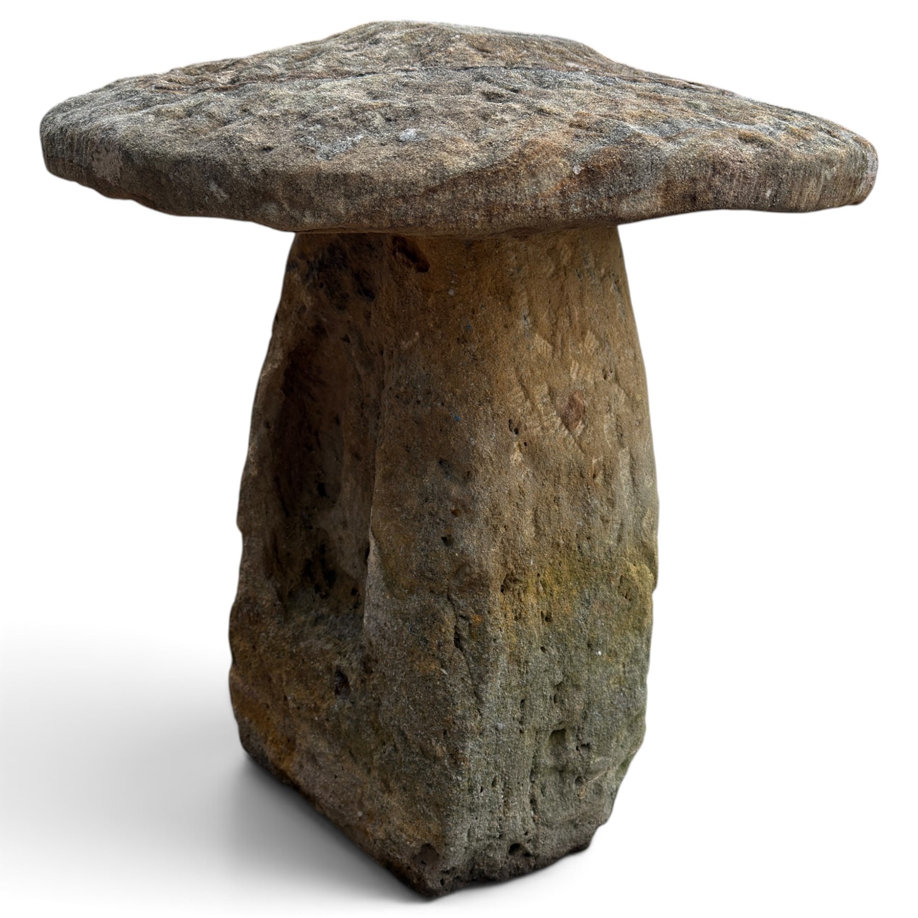 Pair of 19th century weathered hewn sandstone two-piece staddle stones, domed circular top over a tapering base