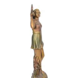 Four Art Deco style figures, modelled as dancers in various poses, finished in gilt and upon wooden plinths, H33cm