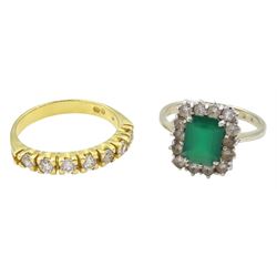18ct gold eight stone cubic zirconia half eternity ring and a white gold green and clear paste stone cluster ring