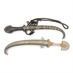 Two North African jambiya in silvered metal sheaths