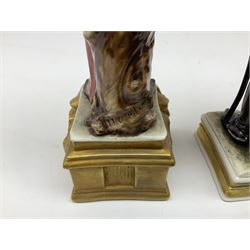 Group of seven Capodimonte figures of soldiers, to include four Bruno-Merli examples including Officer of the 12th Lancers 1820 and Captain of the 18th Hussars 1815, both raised upon ornate gilt plinths bearing British monarch motto in Latin 'Dieu et mon droit', and three further similar, all with crowned N mark beneath, tallest H32cm