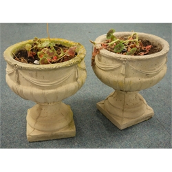  Pair composite circular stone urns classical style mouldings, square base, D36cm, H41cm  