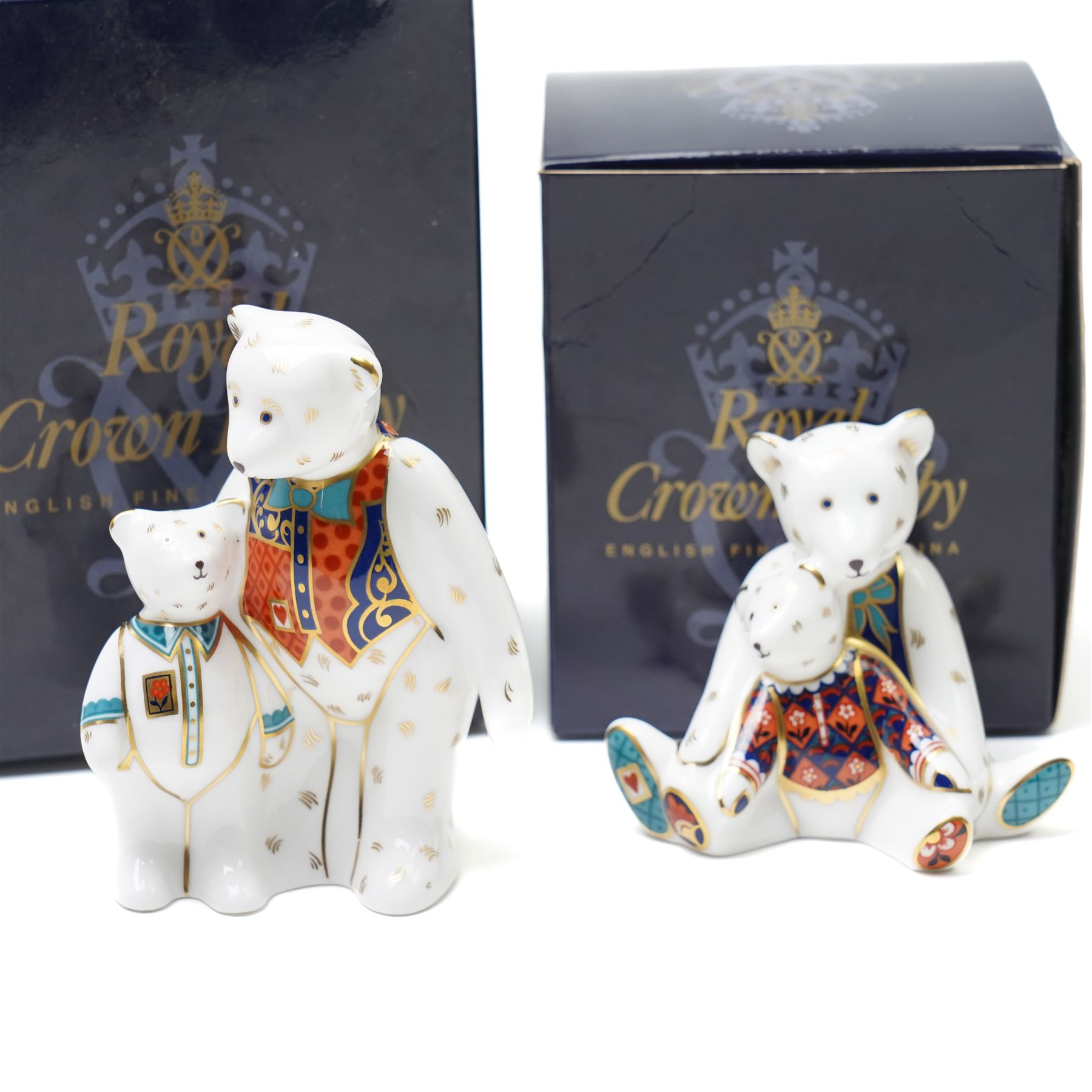 Set of eight Royal Crown Derby teddies, comprising cook, shopping, Daddy and George, Mummy and Charlotte, gardener, school boy, Xmas and Scottish teddy, no stoppers, all boxed (8)