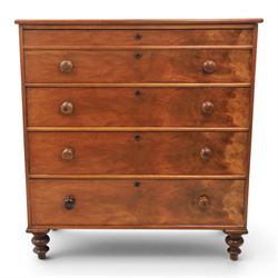 Victorian mahogany chest, with four long  flame mahogany fronted drawers with turned woode...