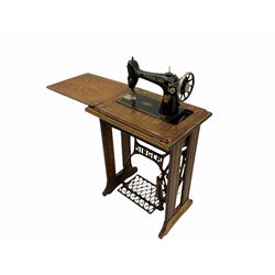 Oak cased Singer treadle sewing machine