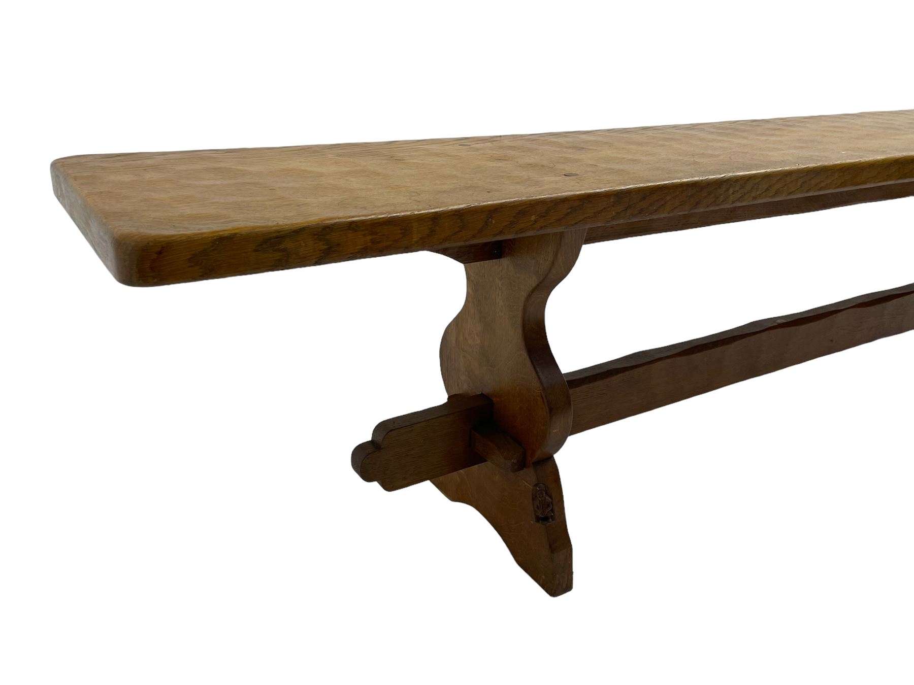 Gnomeman - adzed oak narrow bench, rectangular seat on shaped end supports united by pegged stretcher, carved with gnome signature, by Thomas Whittaker, Little Beck 