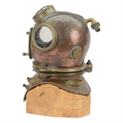 19th century Franz Clouth three bolt copper and brass diving helmet, inscribed 'Franz Clouth Kncinische Gummiwaarenfabrik m b H COLN NIPPES', matching numbers T A 7 on top and corselet rims, with handmade wooden stand, together with a reference book 'Diving Helmets' by Anthony Pardoe, which features the helmet on pages 146 and 147, helmet W42cm, H40cm, H50cm
