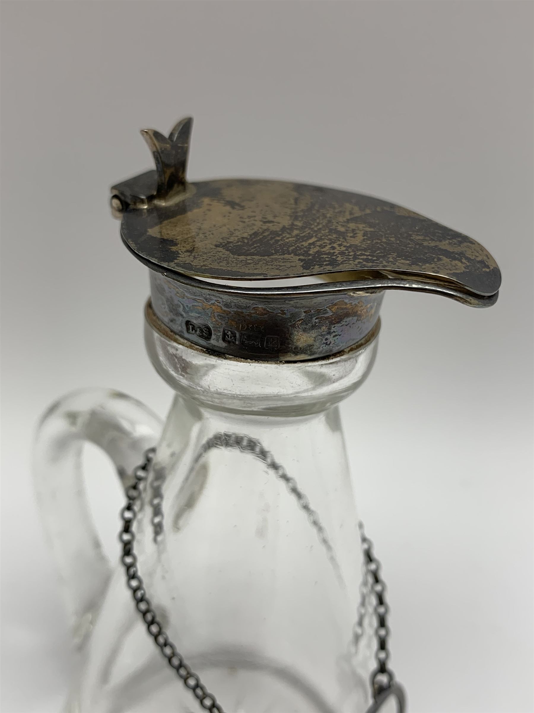 Edwardian silver mounted whisky noggin, of tapering cylindrical form with hinged flat cover, H11cm, together with a silver whisky label, each hallmarked Levi & Salaman, Birmingham 1909