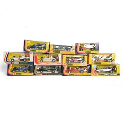 Eleven Corgi diecast Formula 1 models, comprising 152 Ferrari 312 B2, 161 Elf Tyrell Proje...