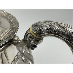 Victorian silver three piece tea service, comprising teapot, twin handled open sucrier, and milk jug, each of bellied form with acanthus capped scroll handles, the sides embossed with alternating scroll edged vacant panels and panels containing a pair of birds, upon four palmette feet, the teapot with ivory insulators to handle, and bird finial to the hinged domed cover, hallmarked William Hunter & Son, London 1861, teapot H19cm, including handles sucrier H13.5cm, including handle milk jug H12cm

This item has been registered for sale under Section 10 of the APHA Ivory Act