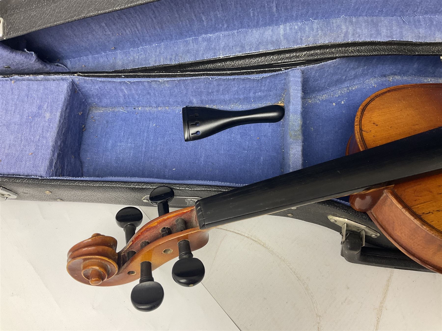 Saxony (?) violin c1950 with 36cm two-piece maple back and ribs and spruce top; bears label 'The Maidstone School Orchestra Association' L59cm overall; and 1950s Czechoslovakian violin for restoration; both in carrying cases (2)