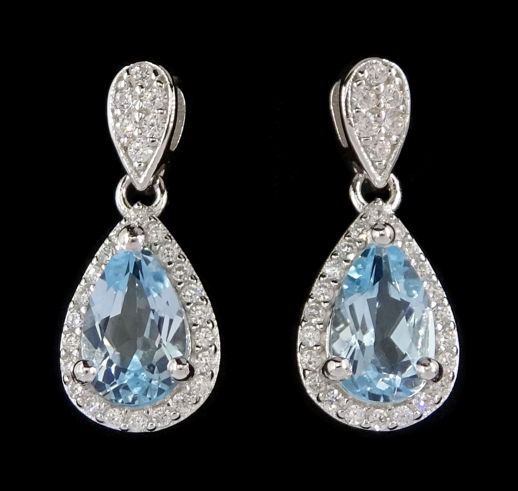 Pair of silver blue topaz and cubic zirconia pendant stud earrings, stamped 925