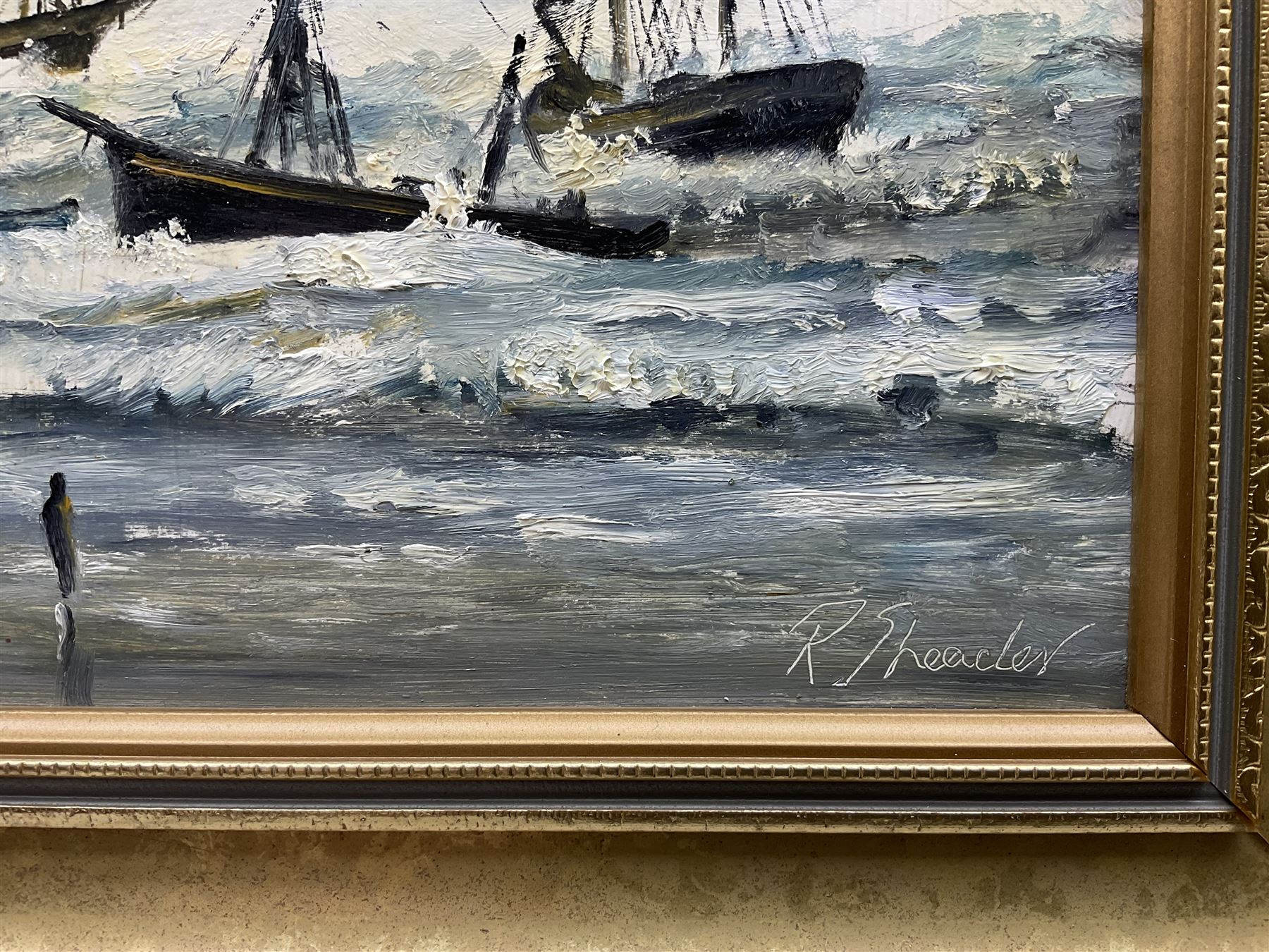 Robert Sheader (British 20th century): Scarborough South Bay at Low and High Tide, pair oils on board signed 21cm x 49cm (2)