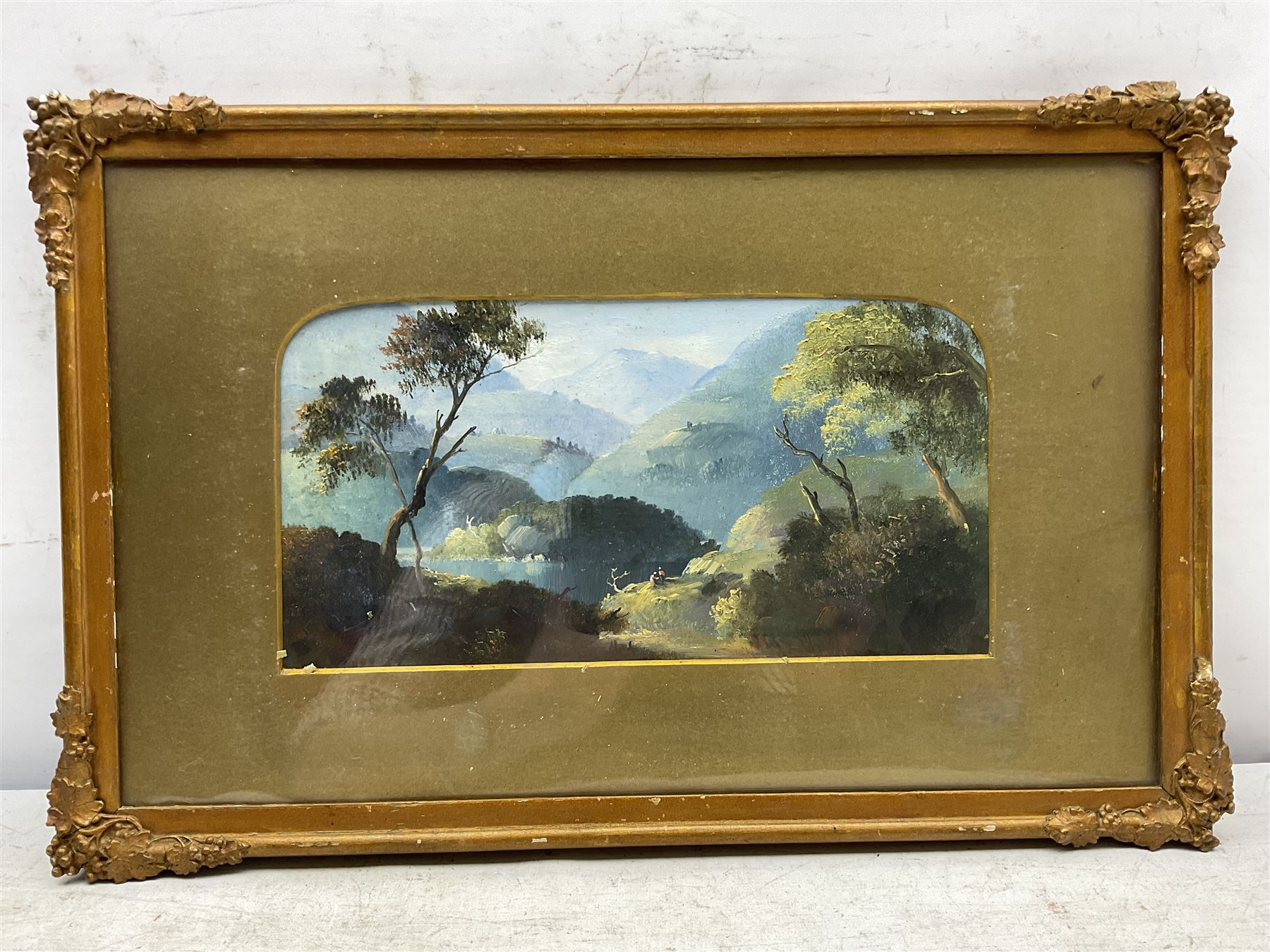 English Colonial School (Late 19th century): Figures on the Lakeside - India, oil on board unsigned 16cm x 31cm 
Notes: inscribed on a partial label verso - 'This sketch represents a scene in Thelatfe, Marrajra / Manajra with the first island in view of which there are 3 in thelatfe(?). It is an original sketch by H ... it is the only one ... like it, he also ... to reproduce it ... Syaid, Italy 1872.'